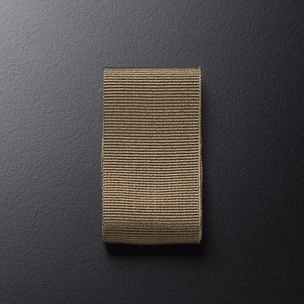 Warm taupe-brown woven swatch with fine horizontal ribs and shadowed edges