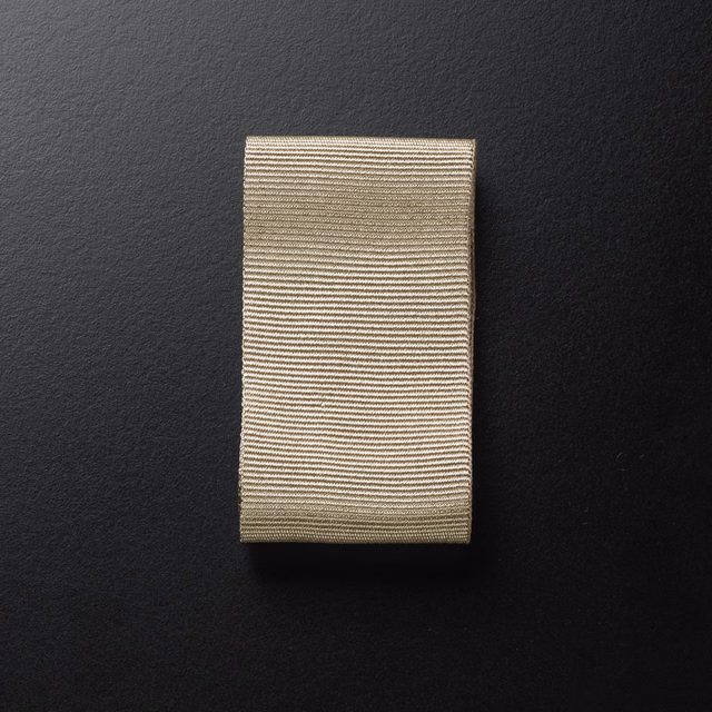 Warm greige taupe textile swatch with fine horizontal ribbed weave