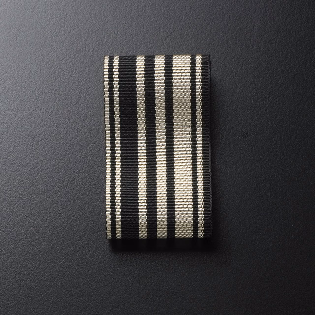 Black and cream vertical stripe weave with fine horizontal rib texture