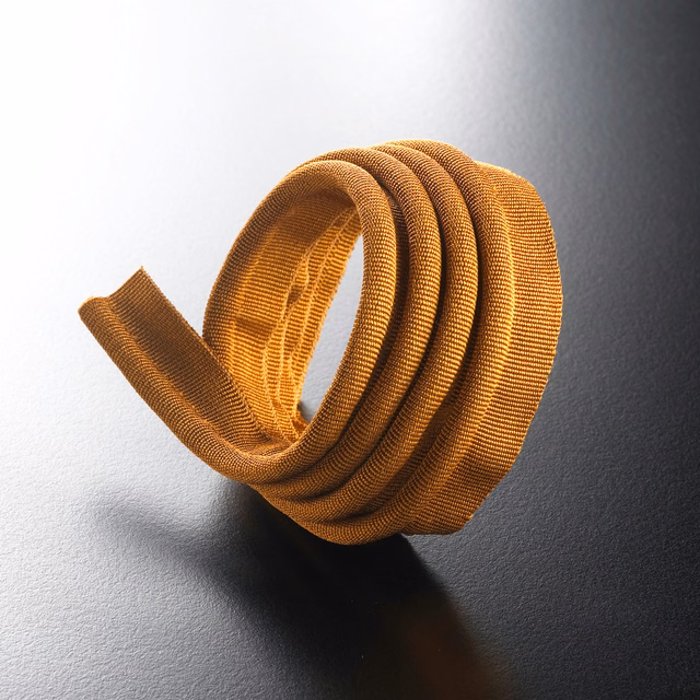 Coiled cognac-brown lipcord with fine ribbed weave and golden side highlights