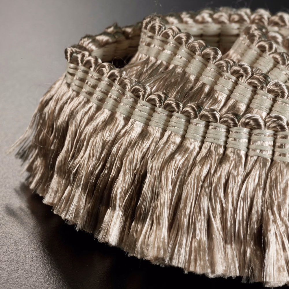 Taupe-beige looped passementerie band with long lustrous fringe