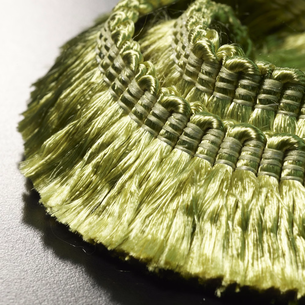 Lustrous olive-green fringe with wrapped loops and long feathery tassels