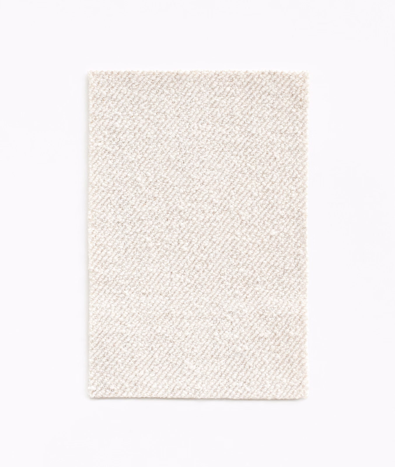 Natural cream upholstery fabric with a fine diagonal woven texture