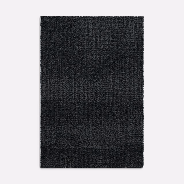 Deep anthracite textile with a fine, subtly mottled woven surface