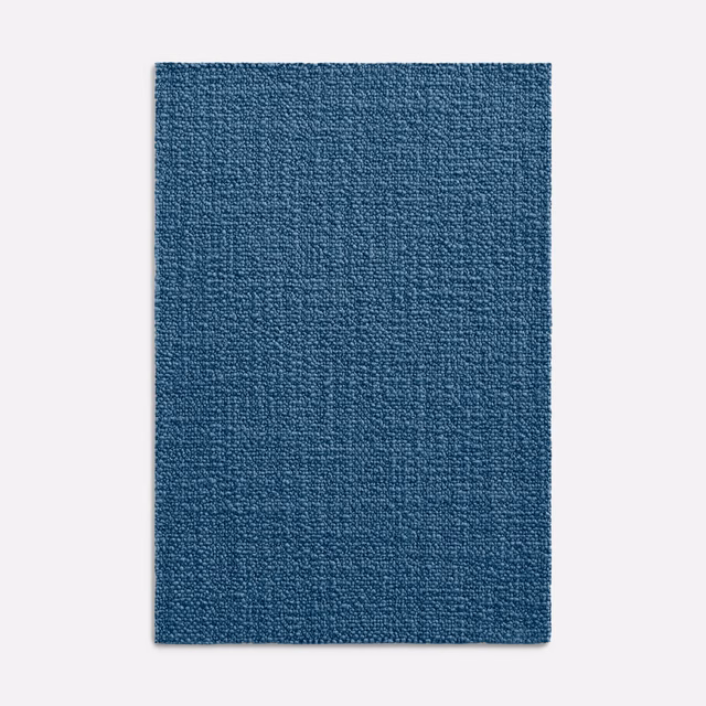 Deep denim-blue woven textile with a fine, tactile crosshatch surface