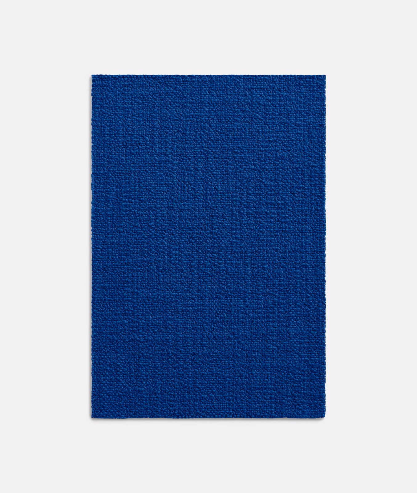 Saturated cobalt-blue woven upholstery swatch with subtle vertical tonal variation