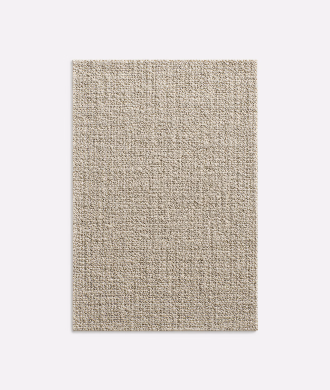 Warm oatmeal-beige Dedar textile with a close, softly irregular woven surface
