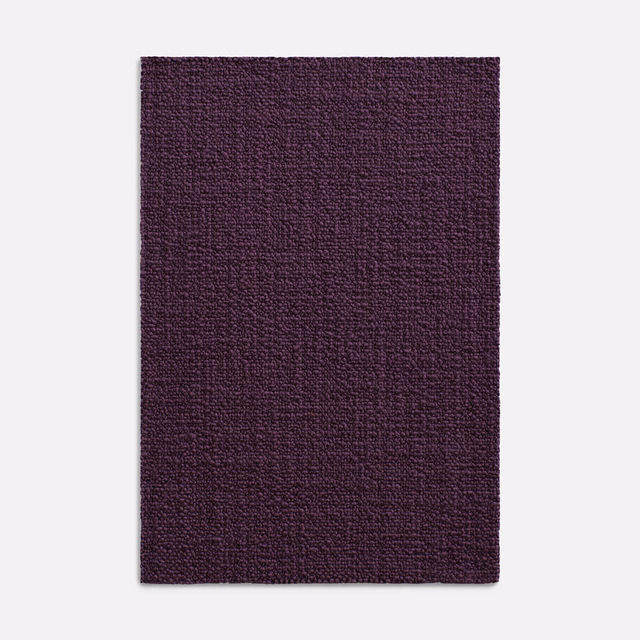 Deep aubergine-purple woven swatch with fine nubby texture and subtle tonal depth