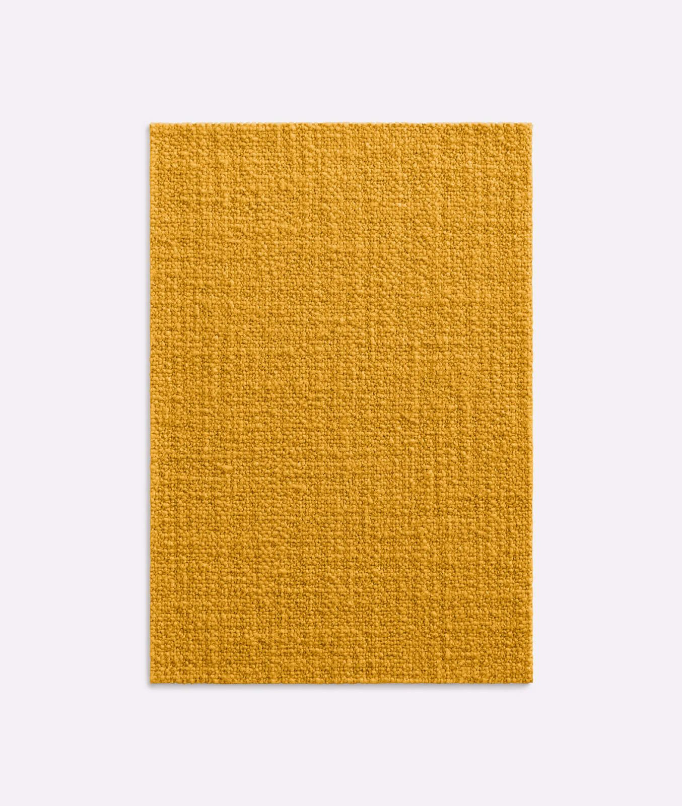 Close view of deep mustard-yellow woven fabric with a softly slubbed tactile surface