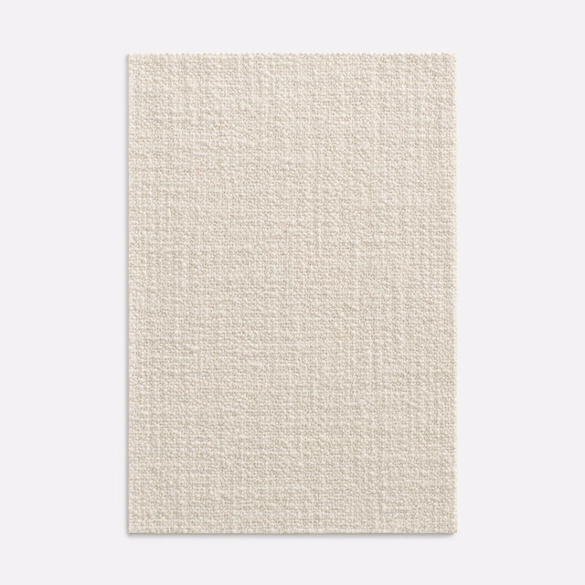 Warm ivory woven upholstery fabric with a fine nubby surface texture