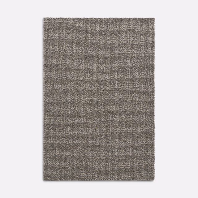 Warm grey taupe woven fabric with fine mottling and subtle vertical texture