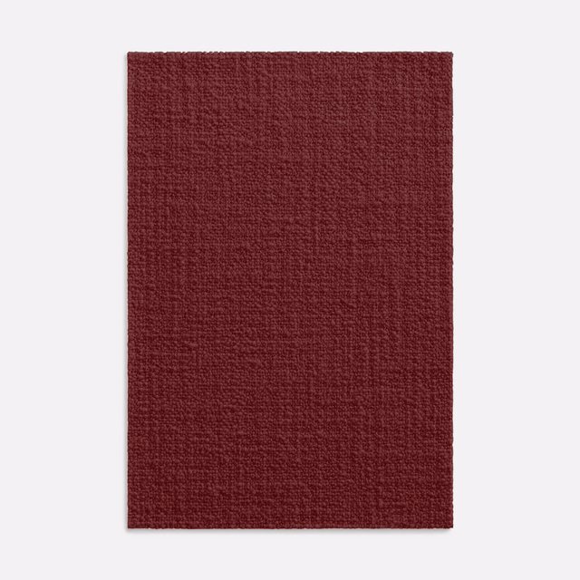 Deep brick-red woven textile with subtle crosshatch texture and low-sheen surface