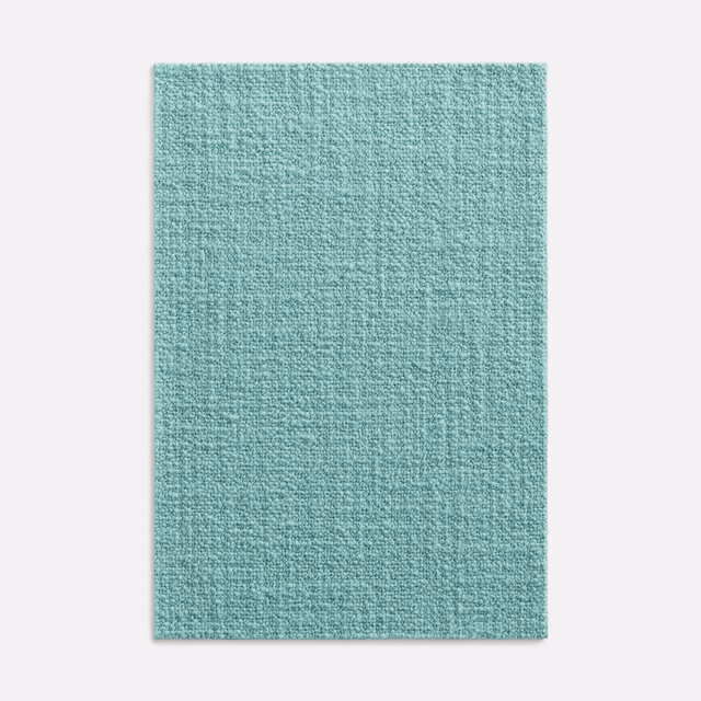 Cool turquoise upholstery swatch with a fine softly crosshatched woven texture