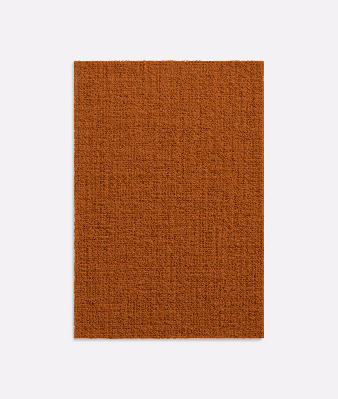 Burnt terracotta textile swatch with a close, subtly ridged woven surface