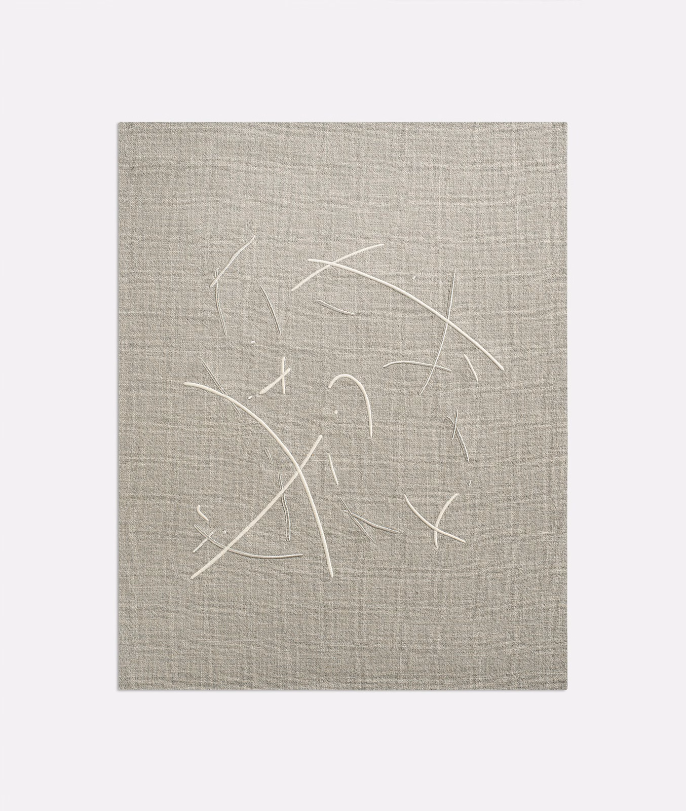 Warm greige woven textile with scattered white curved linear marks and subtle slub texture