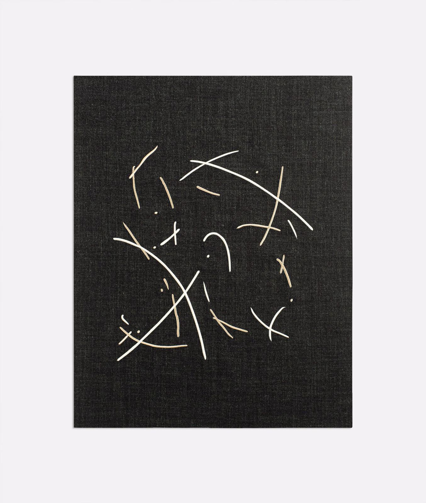Charcoal woven fabric with scattered ivory abstract lines and fine textured ground