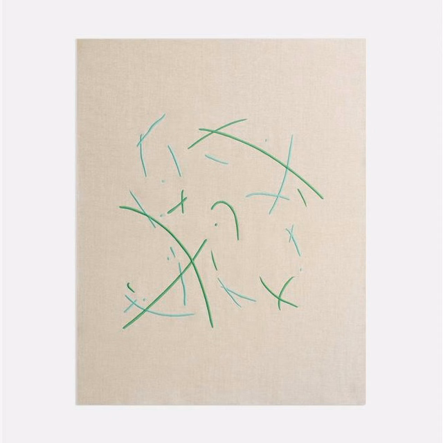 Pale beige woven fabric with scattered fine green abstract strokes