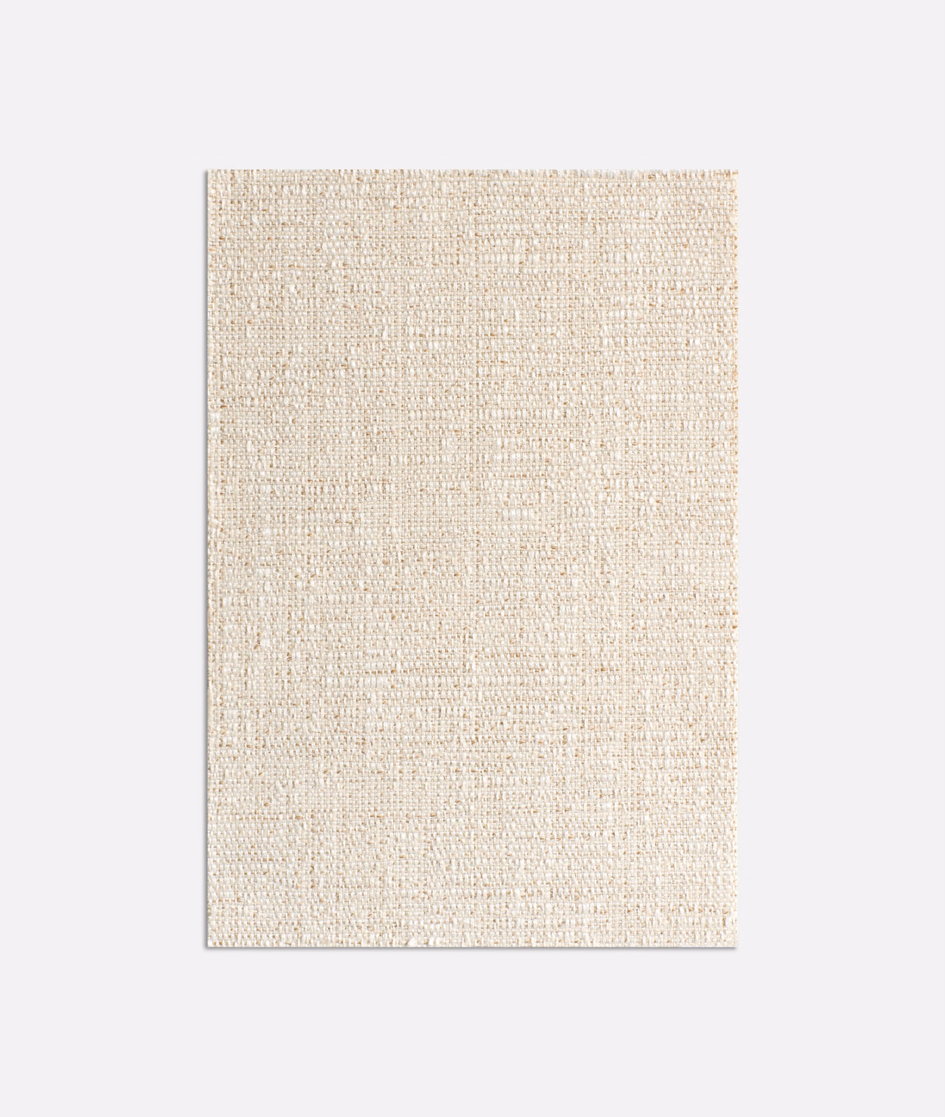Warm ivory woven upholstery fabric with a fine, irregularly textured surface