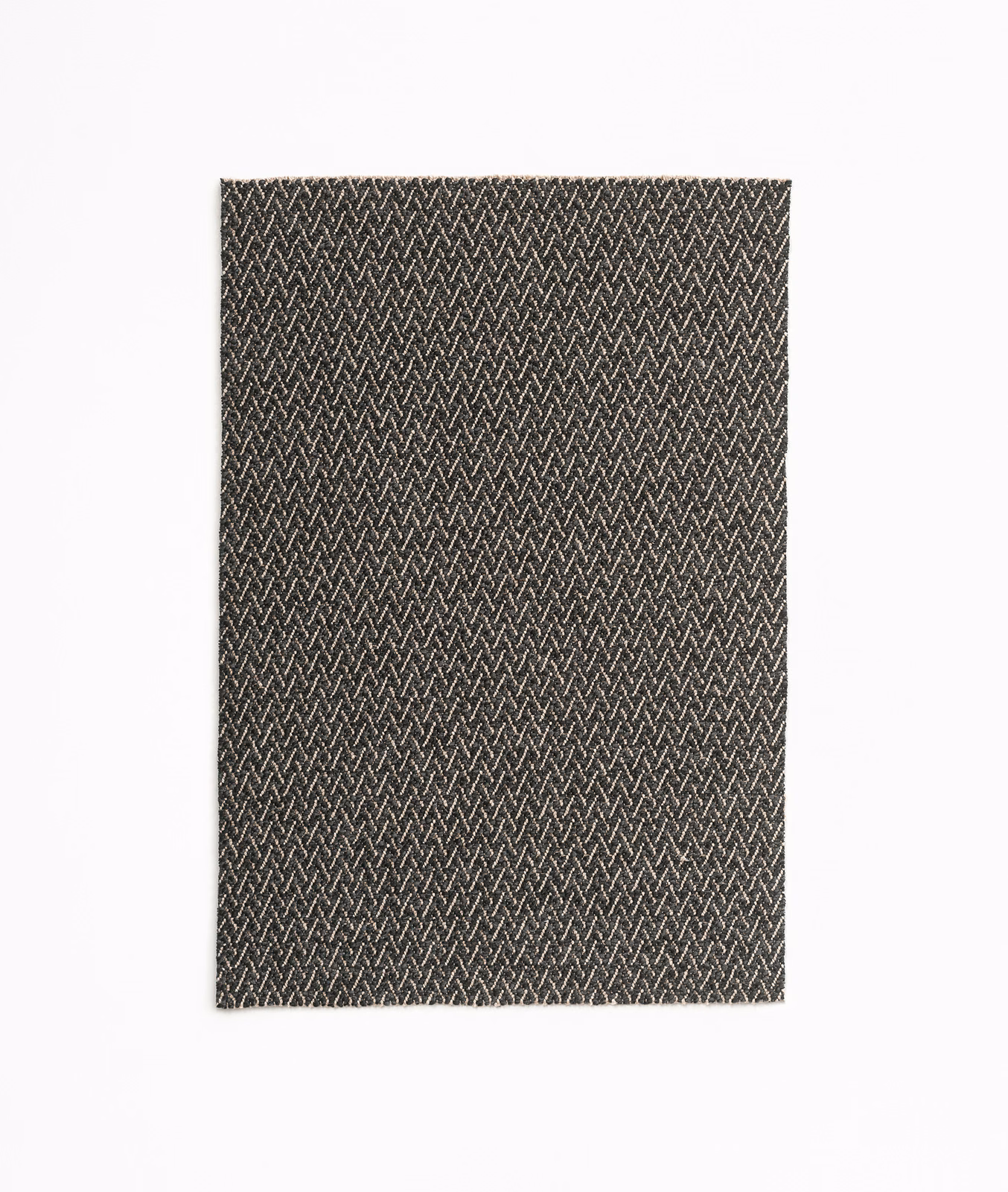 Dark coffee-brown upholstery with fine pale chevrons in a compact woven texture