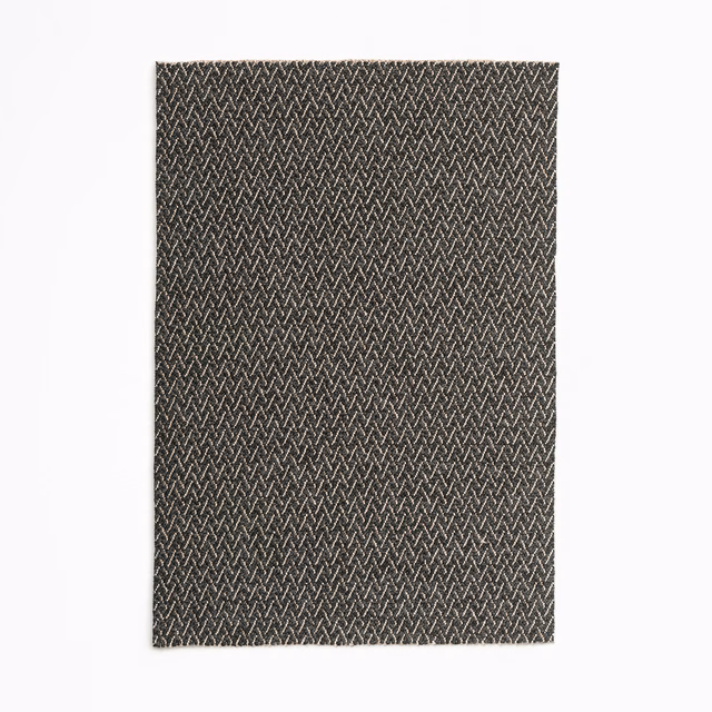 Dark coffee-brown upholstery with fine pale chevrons in a compact woven texture