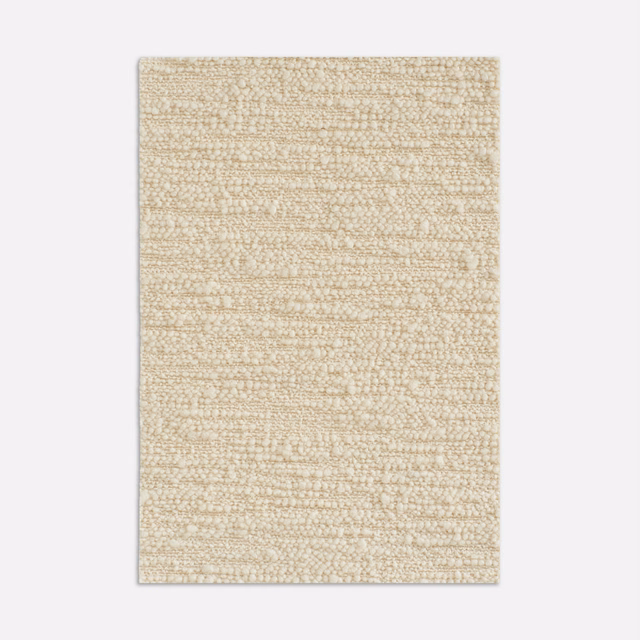 Warm ivory upholstery fabric with nubby horizontal woven texture