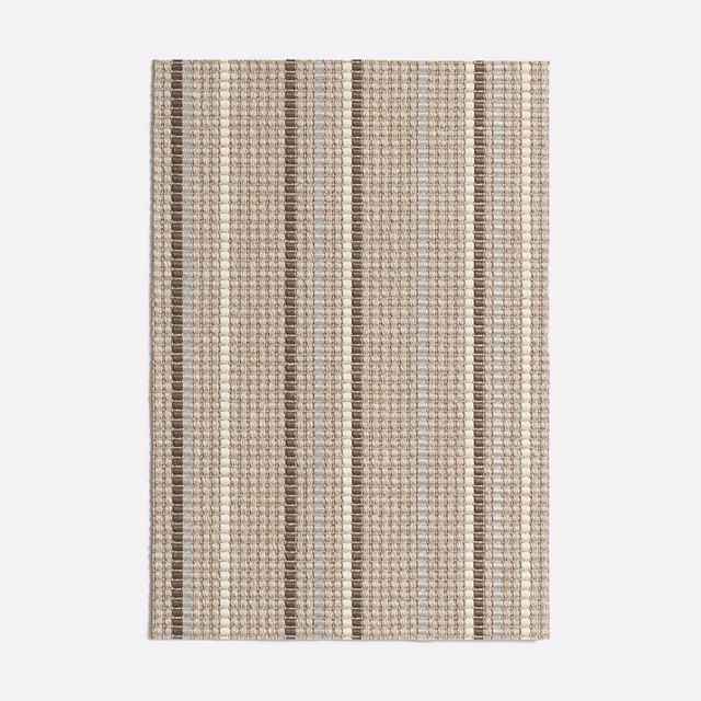 Silver-grey, taupe and cream vertical stripes over a finely checked woven ground
