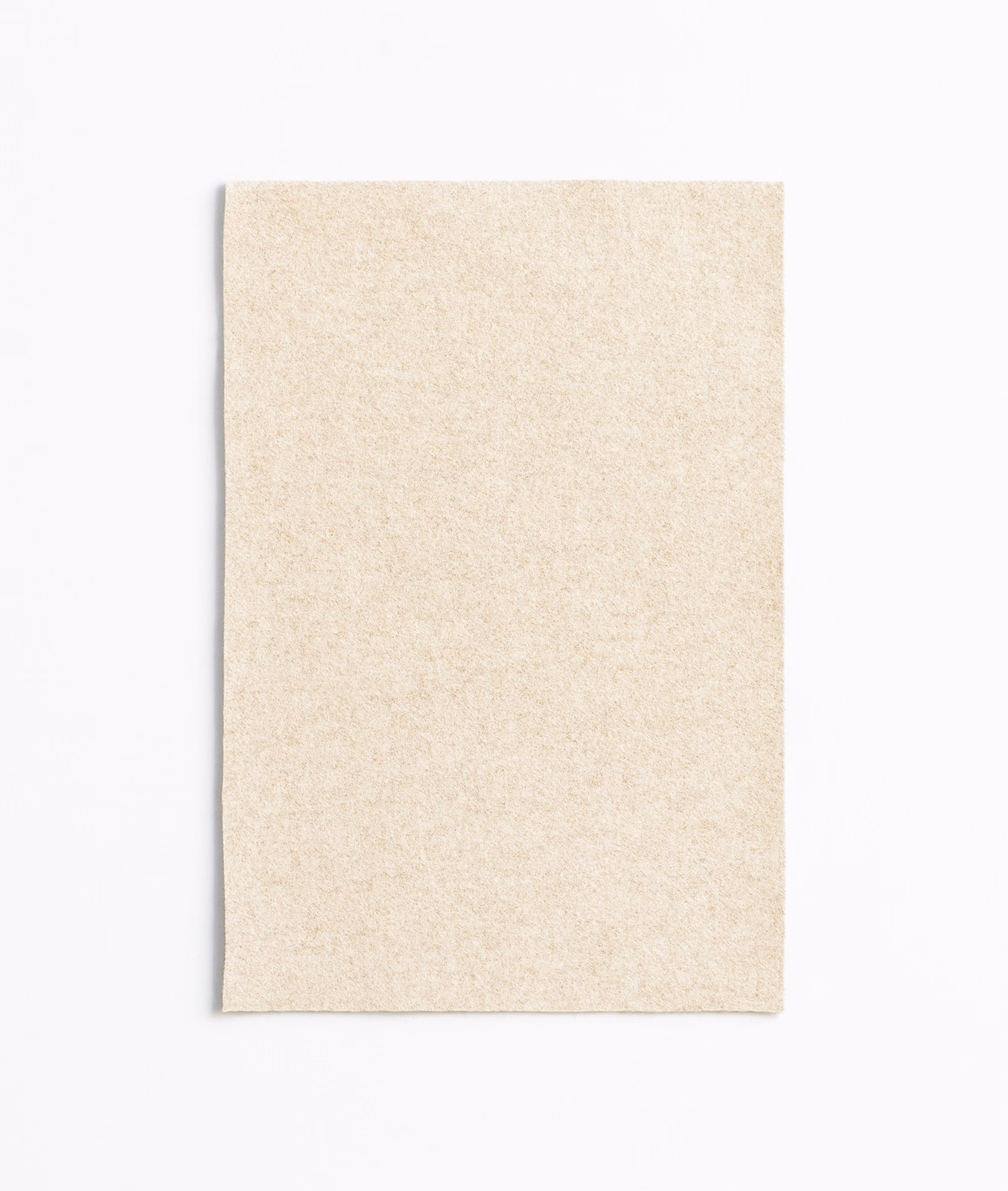 Pale warm-beige swatch with a softly mottled, fine-textured woven surface