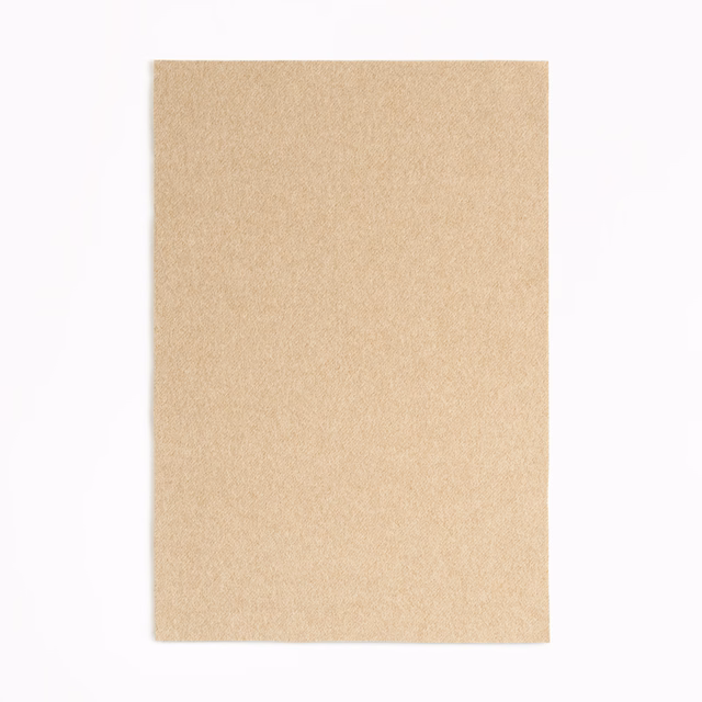 Warm camel-beige plain fabric swatch with a softly brushed, subtly textured surface