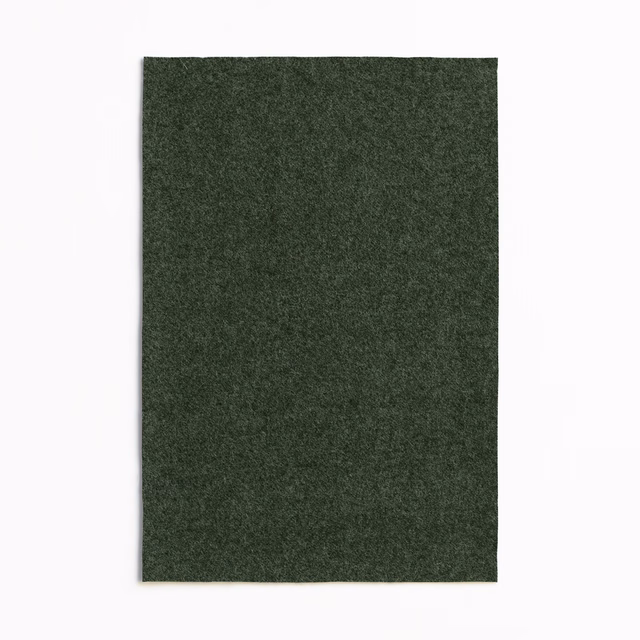 Deep loden-green upholstery textile with a dense, softly mottled woven surface