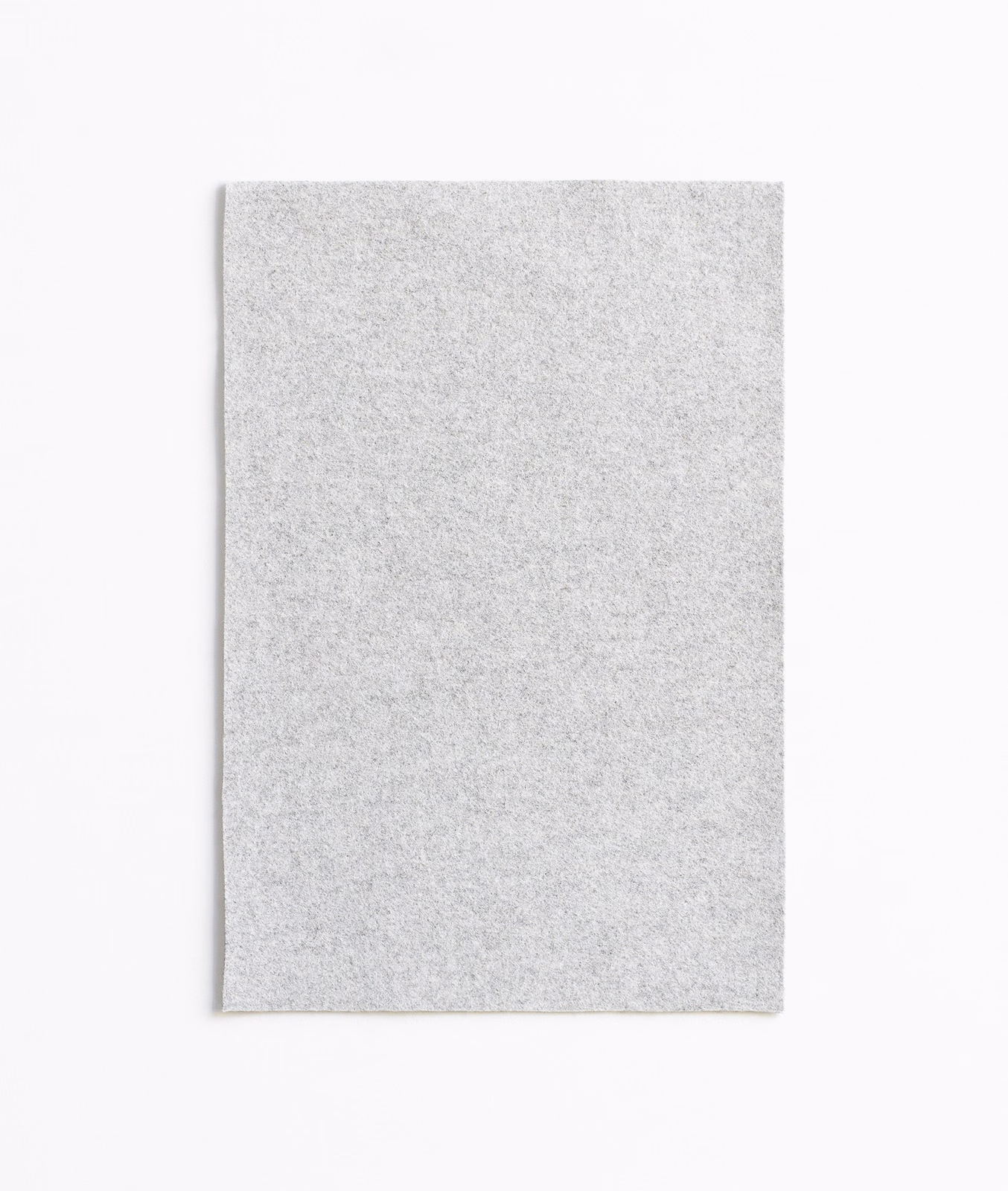 Pale silver-grey fabric swatch with a fine, softly mottled woven texture
