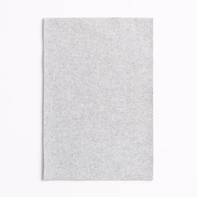 Pale silver-grey fabric swatch with a fine, softly mottled woven texture