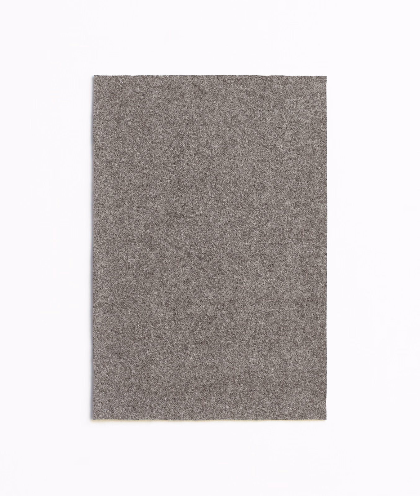 Dense Chapeau Taupe textile with a softly mottled warm grey-brown surface