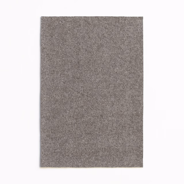 Dense Chapeau Taupe textile with a softly mottled warm grey-brown surface