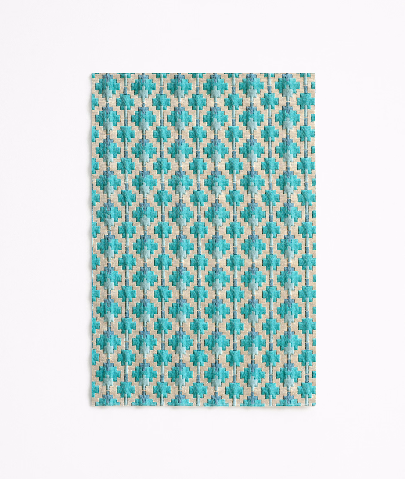 Teal and ivory diamond lattice with mottled woven texture on a rectangular swatch