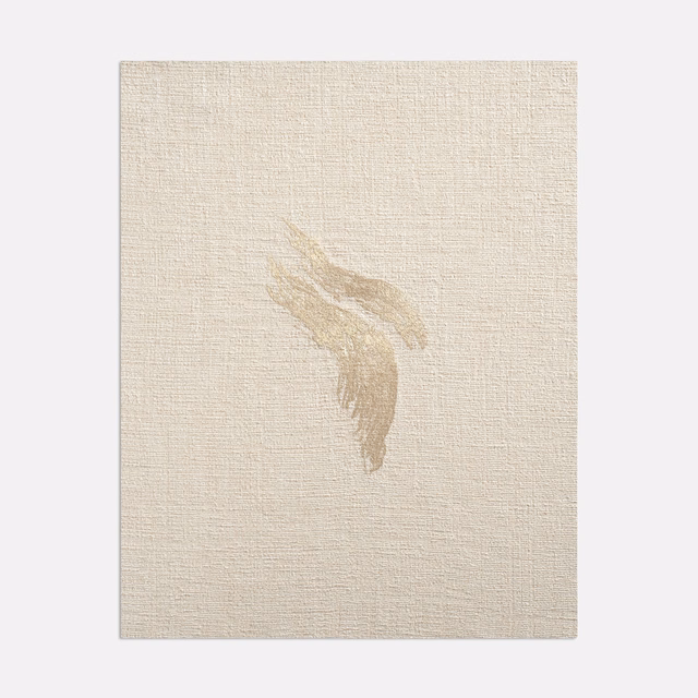 Warm ivory woven fabric with a muted taupe-gold feather-like abstract motif