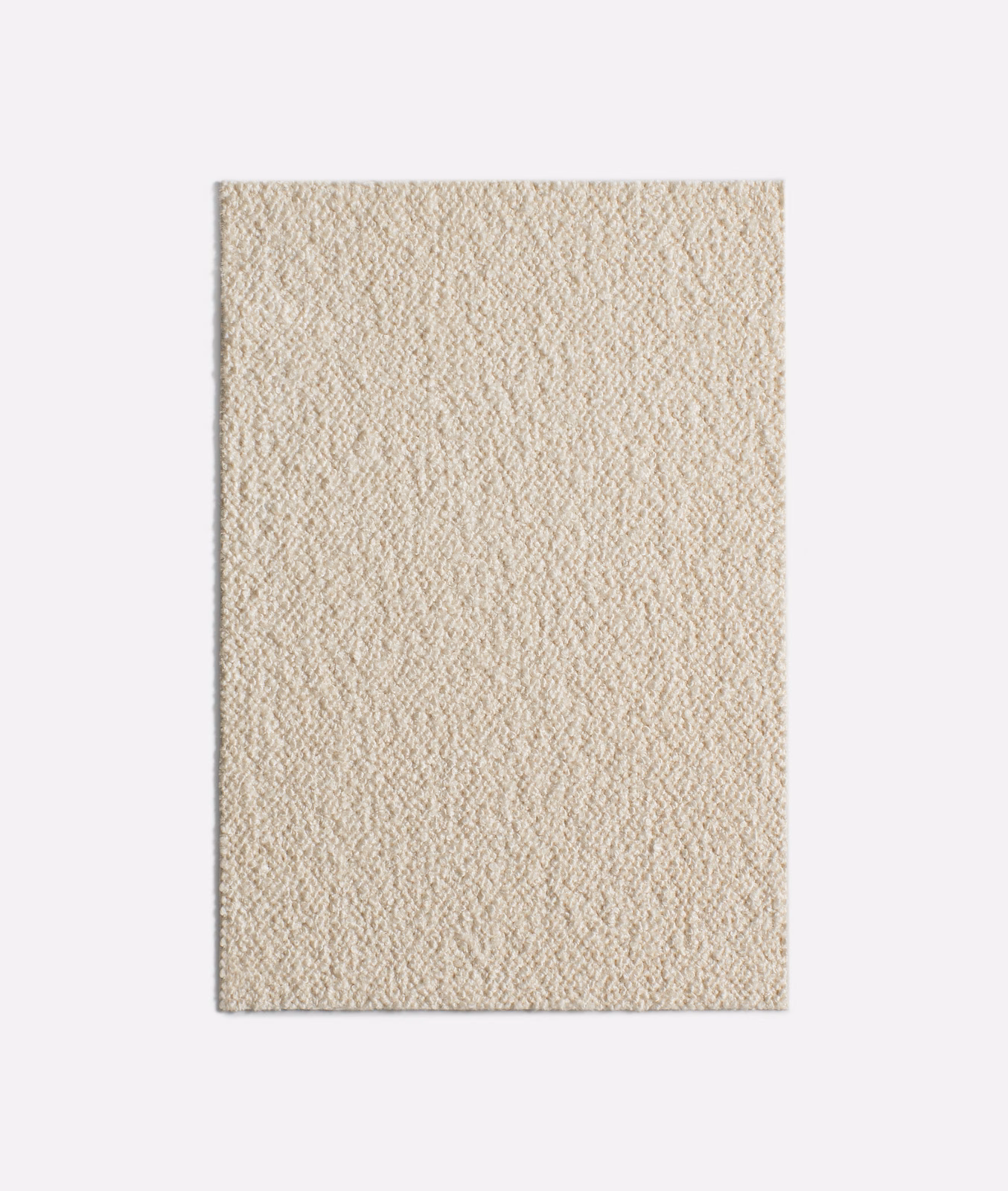 Warm ivory Dedar fabric swatch with a small-scale irregular nubby woven texture
