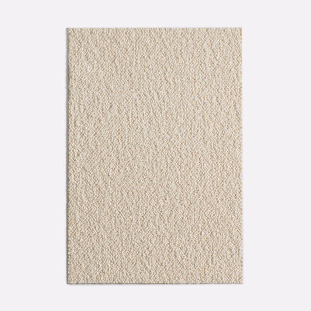 Warm ivory Dedar fabric swatch with a small-scale irregular nubby woven texture