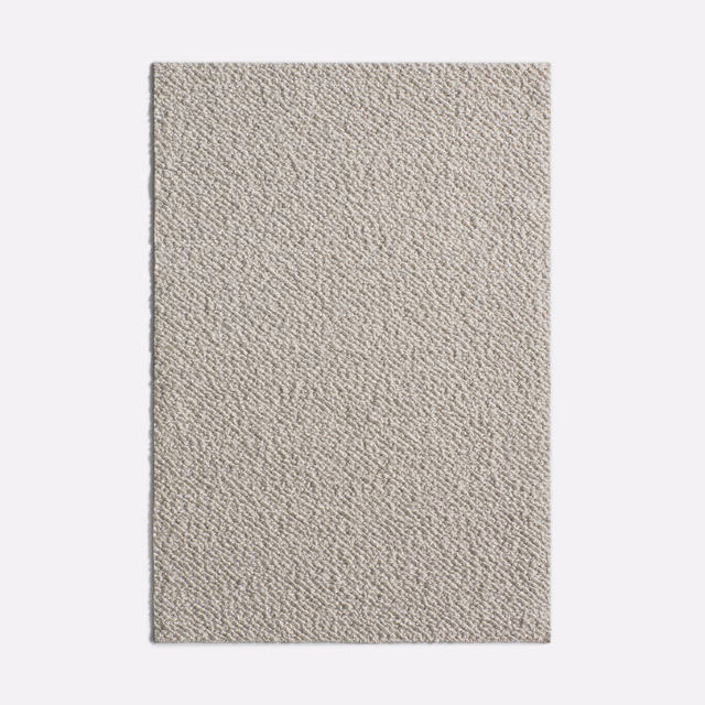 Pale warm greige Diapason Perla fabric with a fine, pebbled woven texture