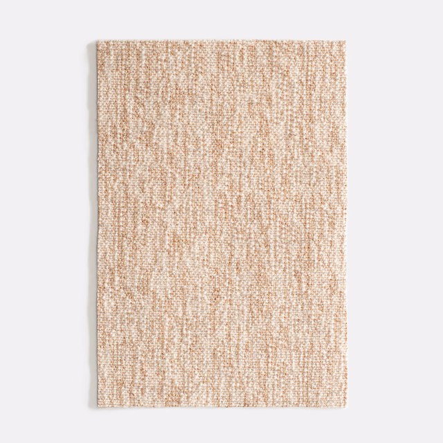 Pale powder-blush and cream upholstery weave with fine irregular vertical slub lines