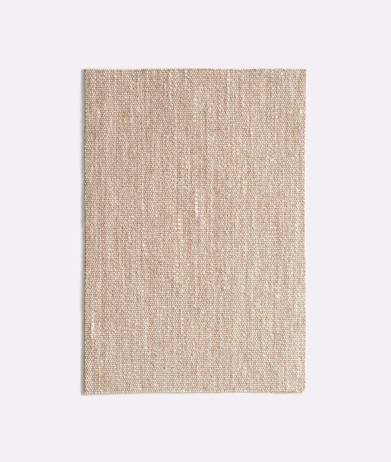 Warm beige woven upholstery fabric with fine vertical slubs and tactile texture