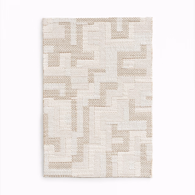 Warm ecru woven swatch with raised angular maze lines and fine grid texture