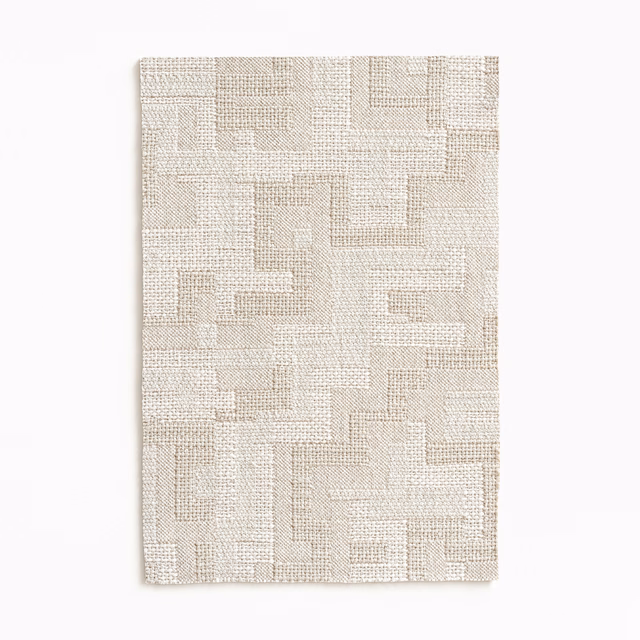 Pale linen-beige woven fabric with interlocking rectangular blocks and tactile crosshatched texture