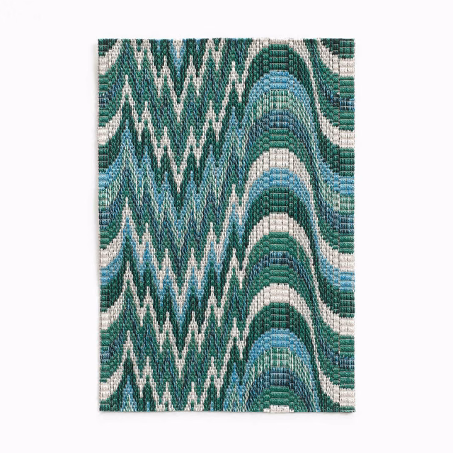 Deep teal woven swatch with ivory zigzags, blue bands and rounded arches