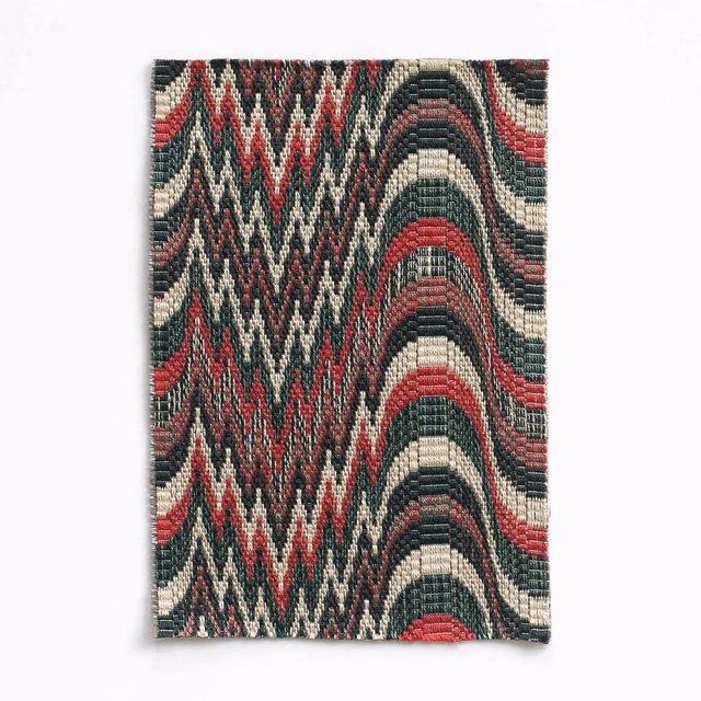 Oxblood, green and cream geometric woven swatch with zigzags and arched bands
