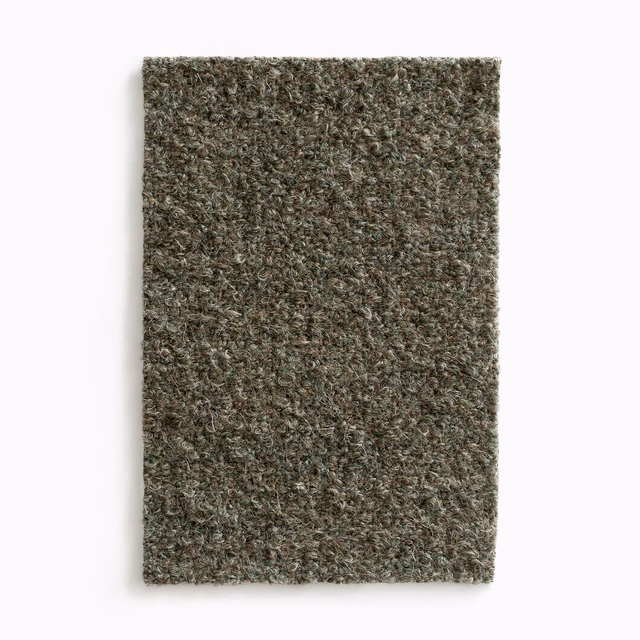 Close view of dense taupe-brown nubby weave with olive-grey flecks