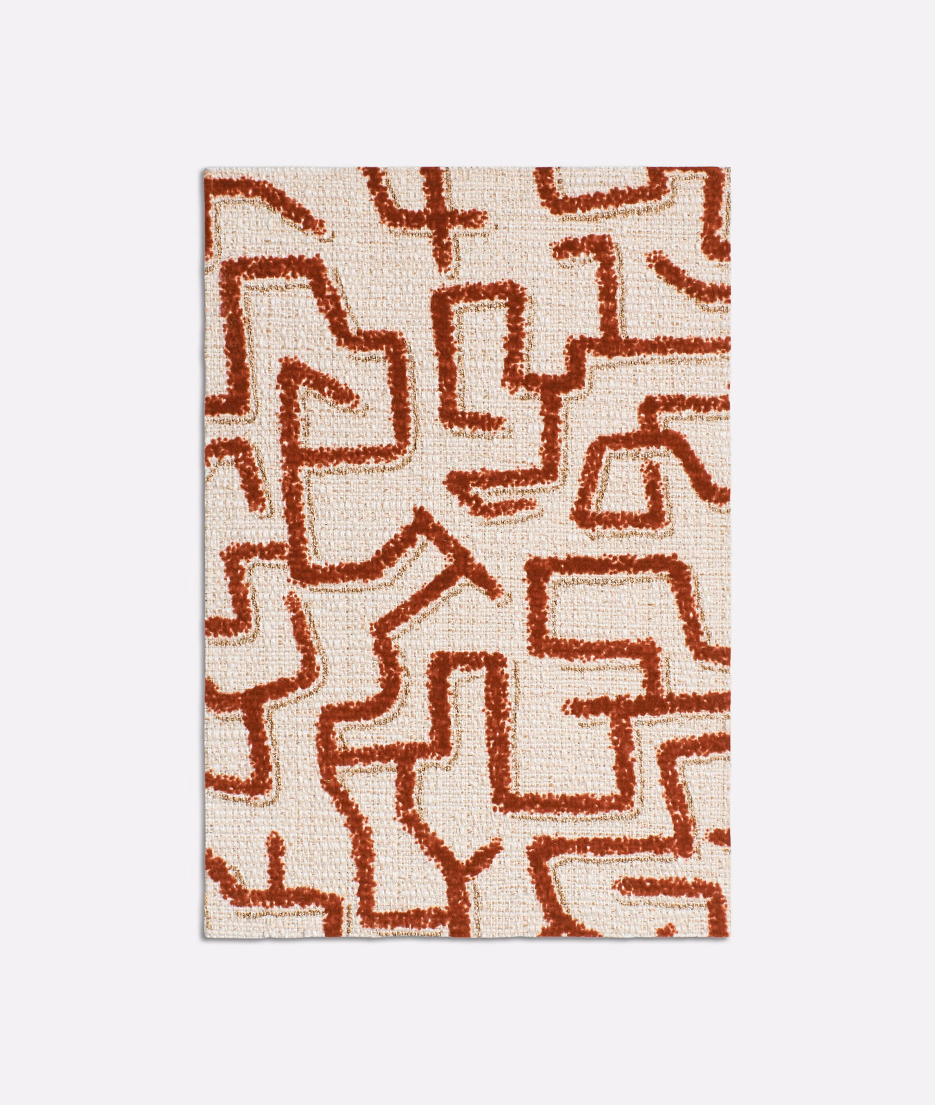 Paprika-red abstract maze lines on an ivory textured woven upholstery swatch