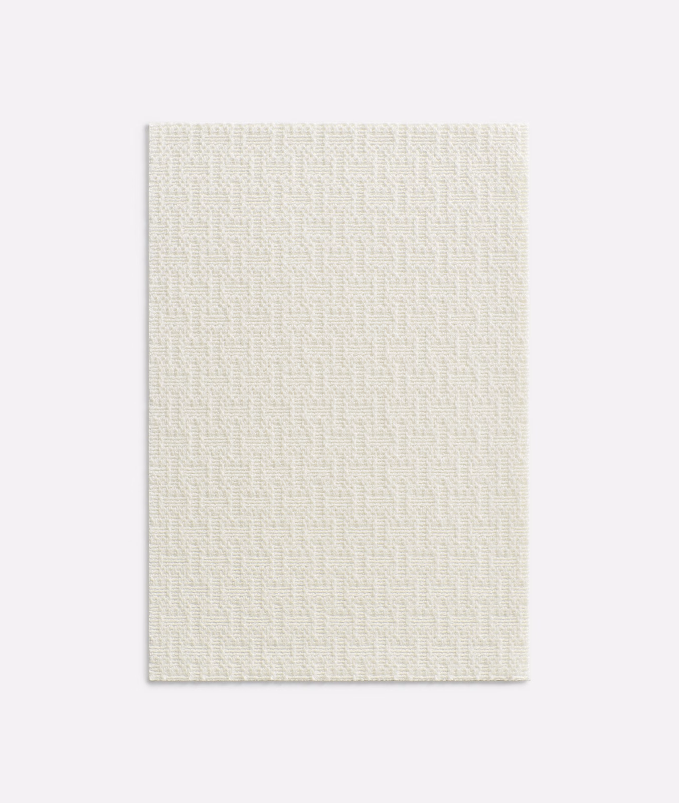 Soft ivory Grenadine Neve upholstery fabric with a fine irregular woven texture