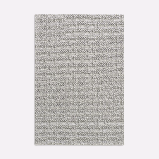 Pale silvery-grey upholstery swatch with dense broken-line woven texture