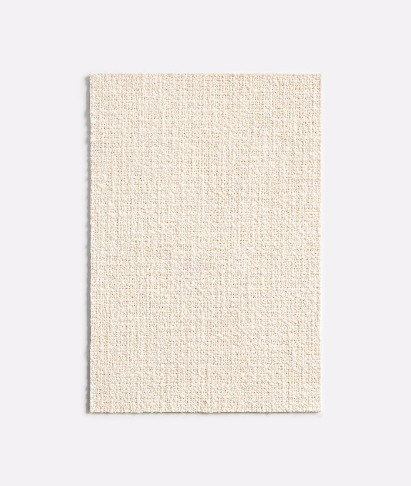 Warm ivory fabric swatch showing a finely textured, subtly flecked plain weave