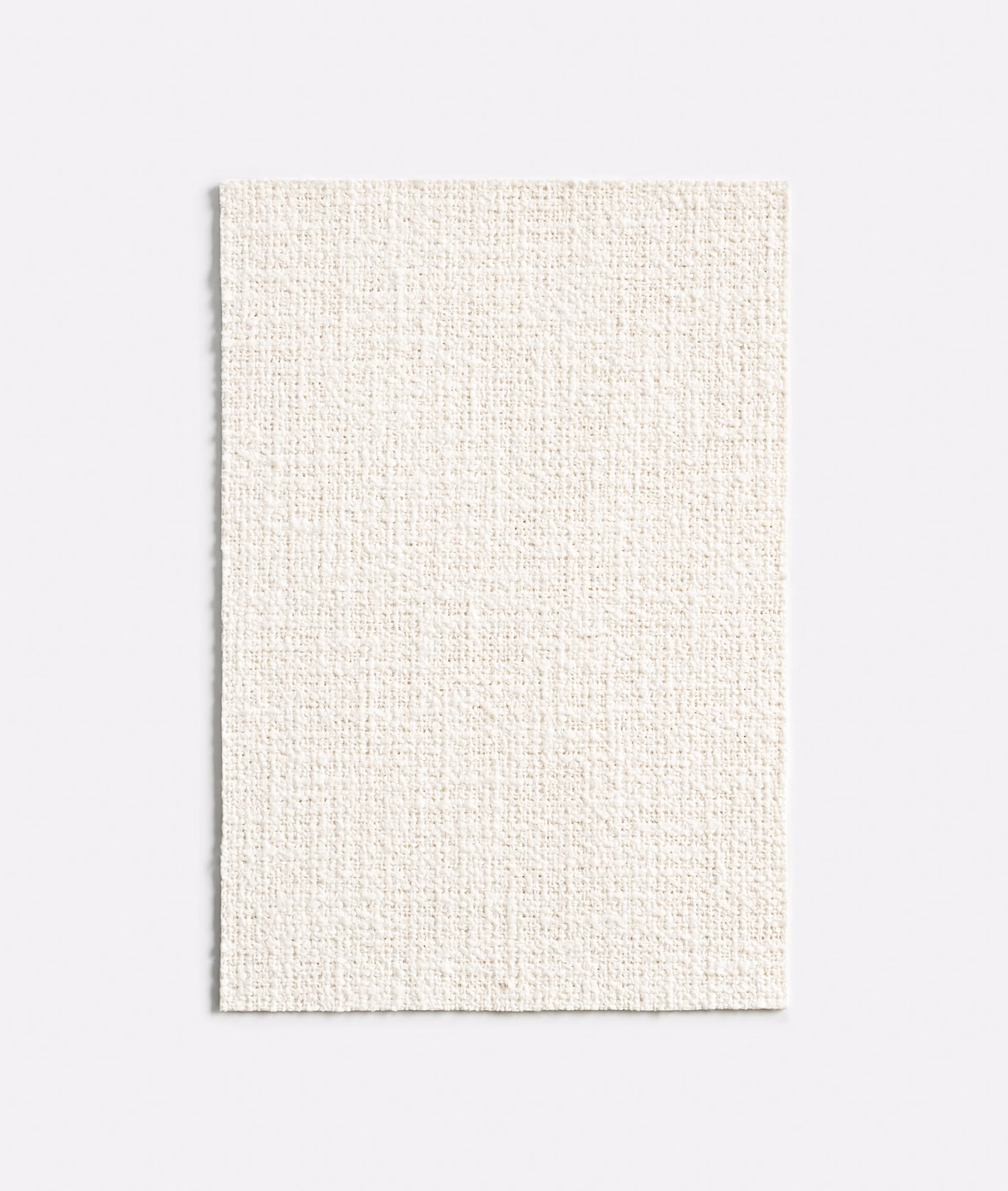 Rectangular swatch of warm ivory fabric with a finely textured plain weave